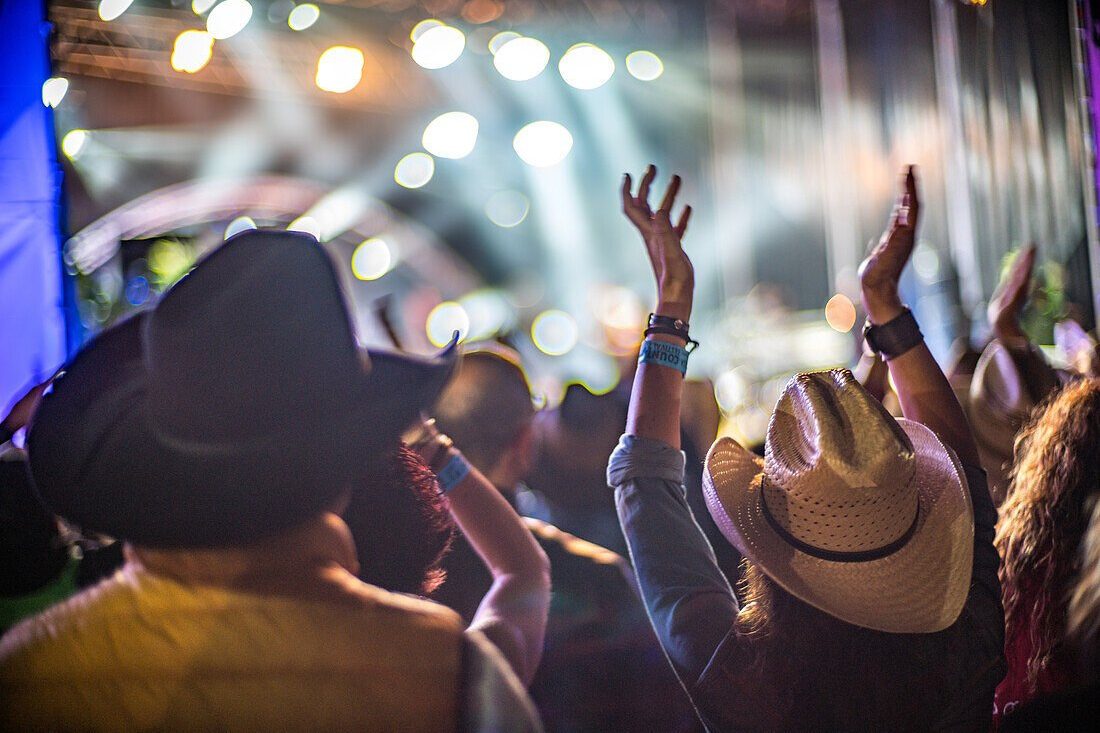 A crowd enjoying a country music performance in 2026