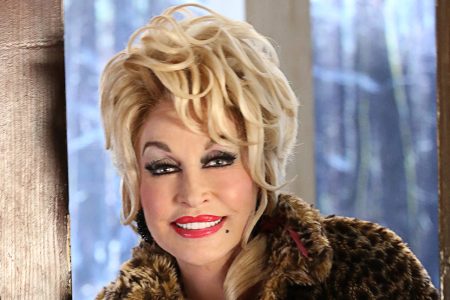 DOLLY PARTON'S CHRISTMAS OF MANY COLORS: CIRCLE OF LOVE -- Season: 1--  Pictured: Dolly Parton as Painted Lady -- (Photo by: Quantrell Colbert/NBC)